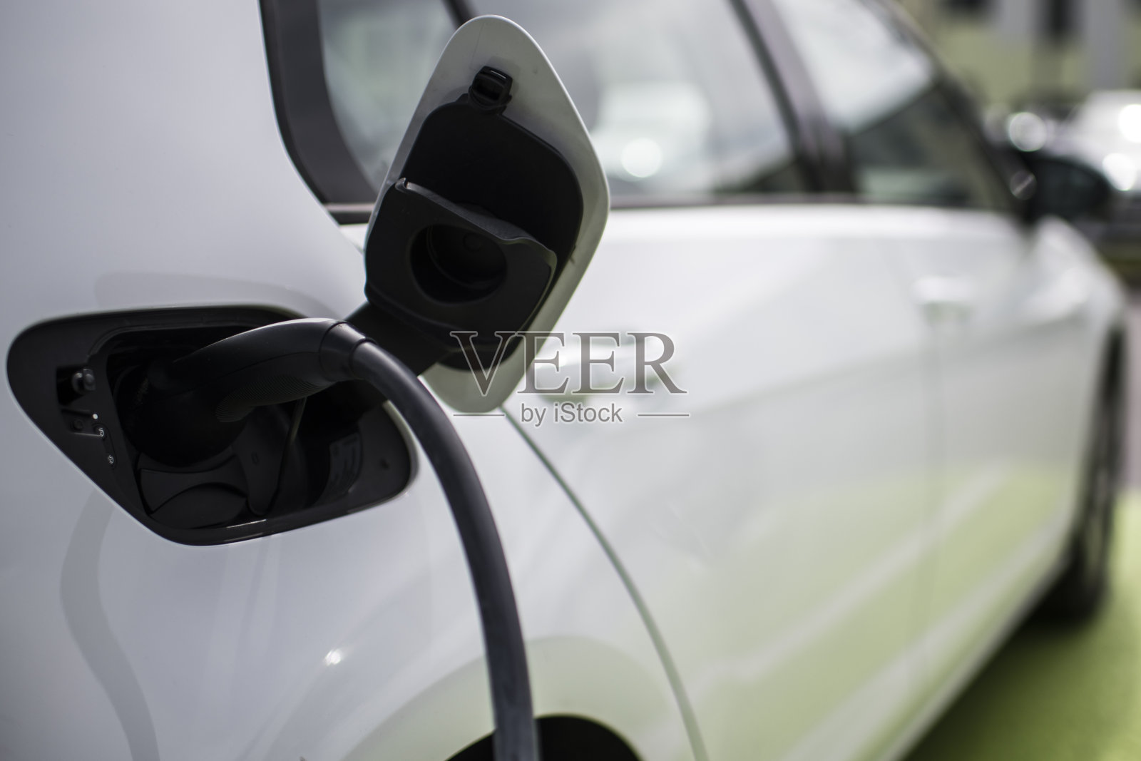 电动汽车充电器照片摄影图片