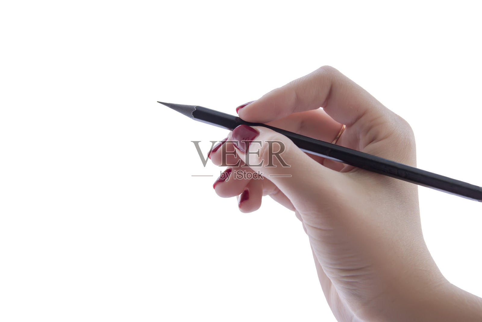 手里拿着一支白色背景上的铅笔照片摄影图片