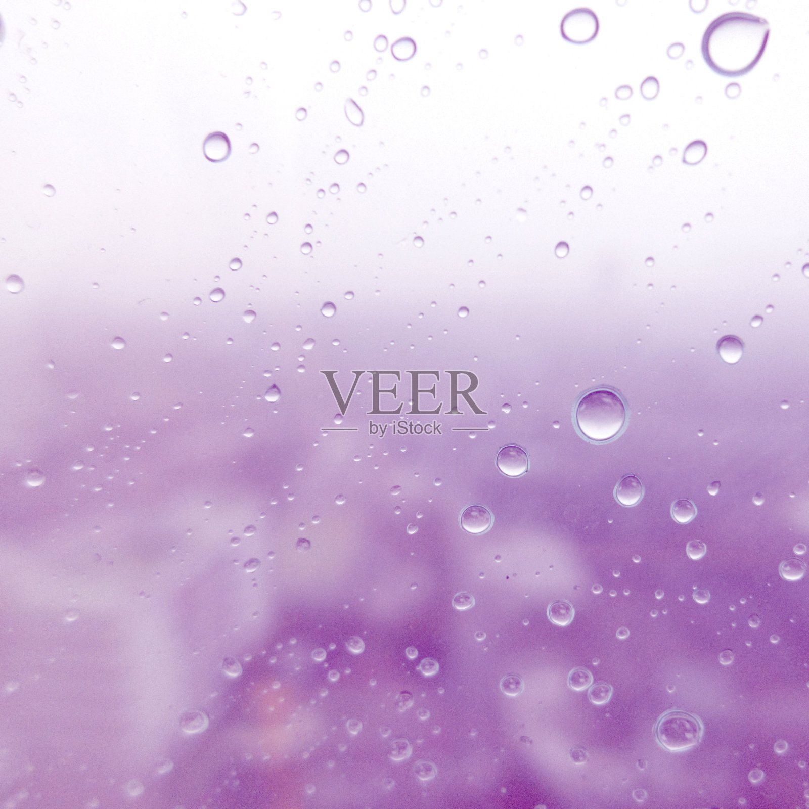 特写的水滴玻璃表面作为背景照片摄影图片