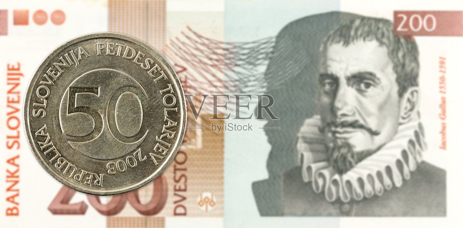 50斯洛文尼亚托拉硬币对200斯洛文尼亚托拉纸币正面照片摄影图片