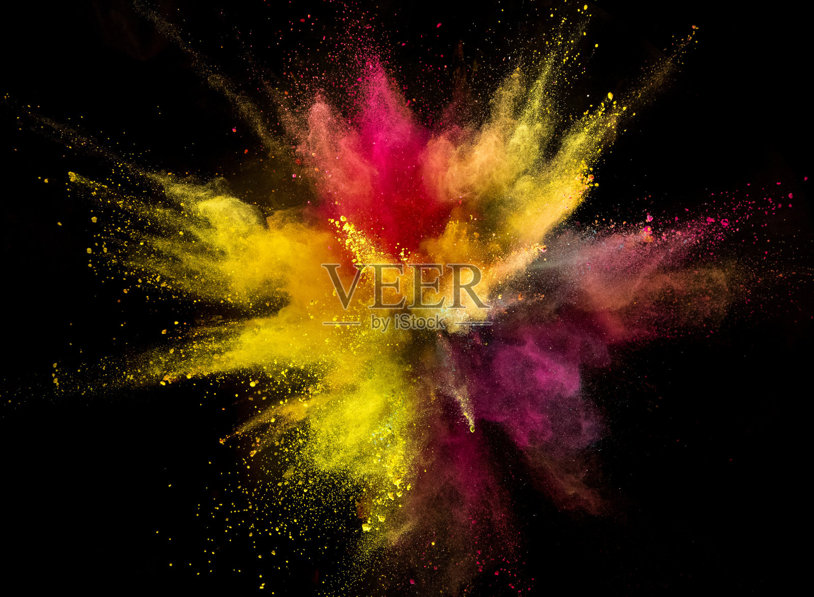 彩色粉末在黑色背景上爆炸照片摄影图片