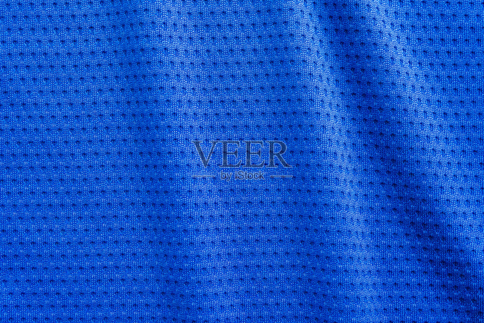 蓝色面料运动服装足球运动衫与空气网状纹理背景照片摄影图片
