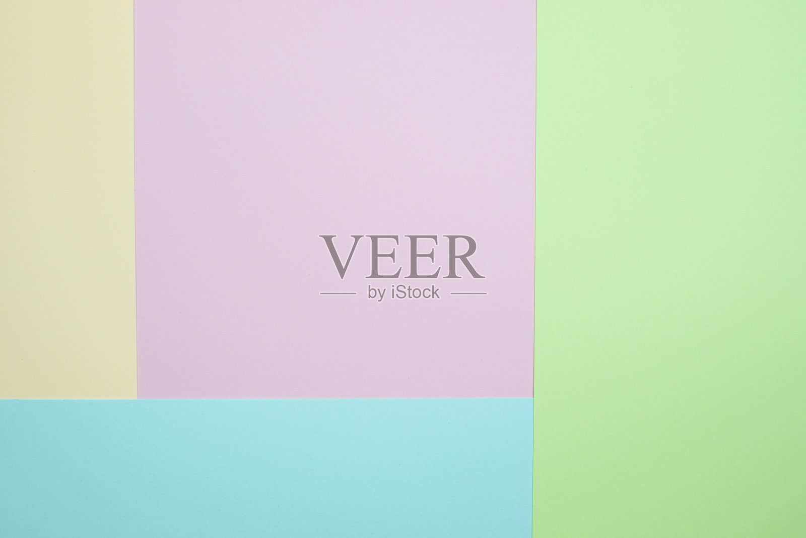 时尚的粉彩纸平铺顶视图，几何背景纹理，粉色，紫色，黄色，米黄色，绿色和蓝色。照片摄影图片