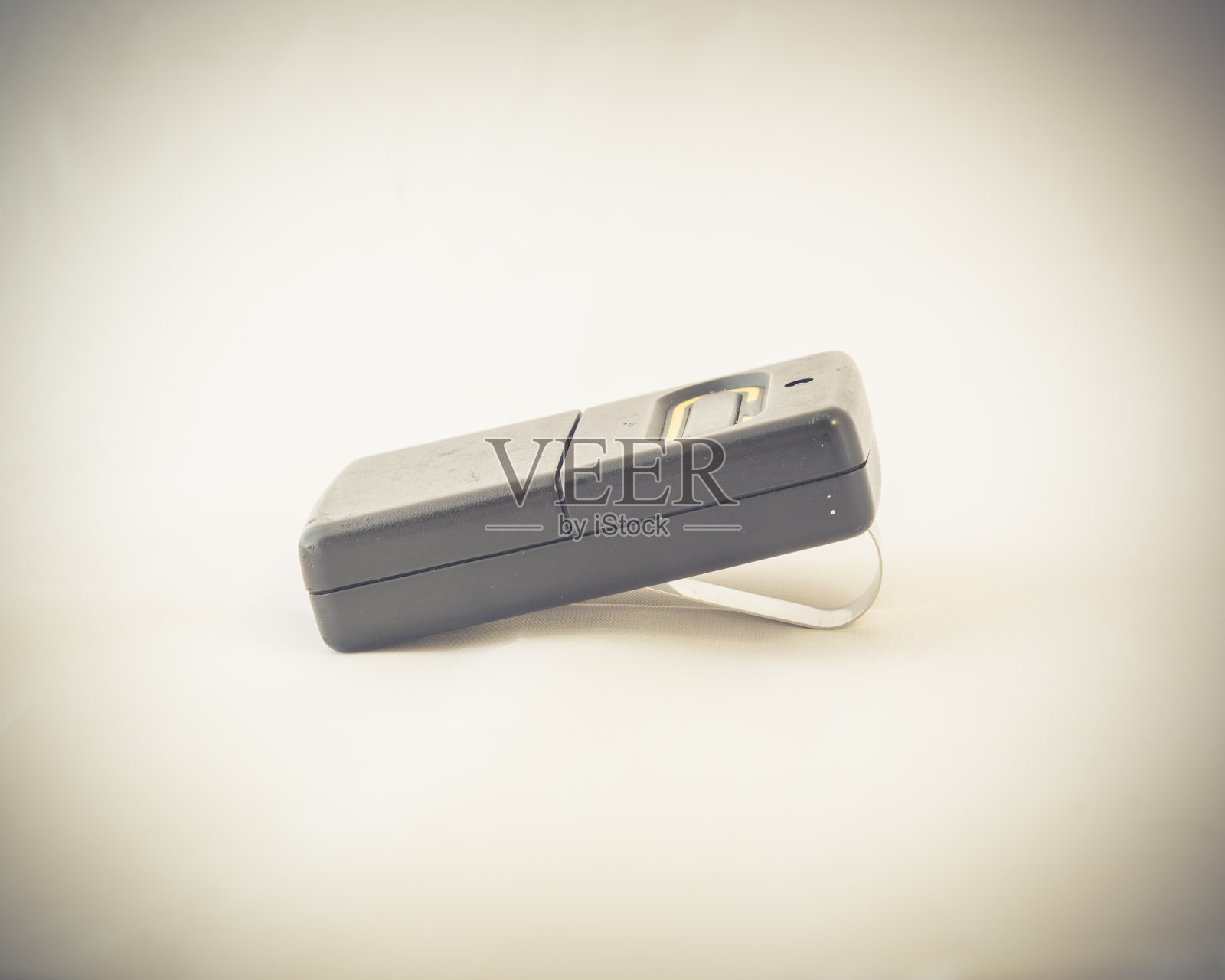 工作室拍摄车库遥控器与遮阳板夹照片摄影图片