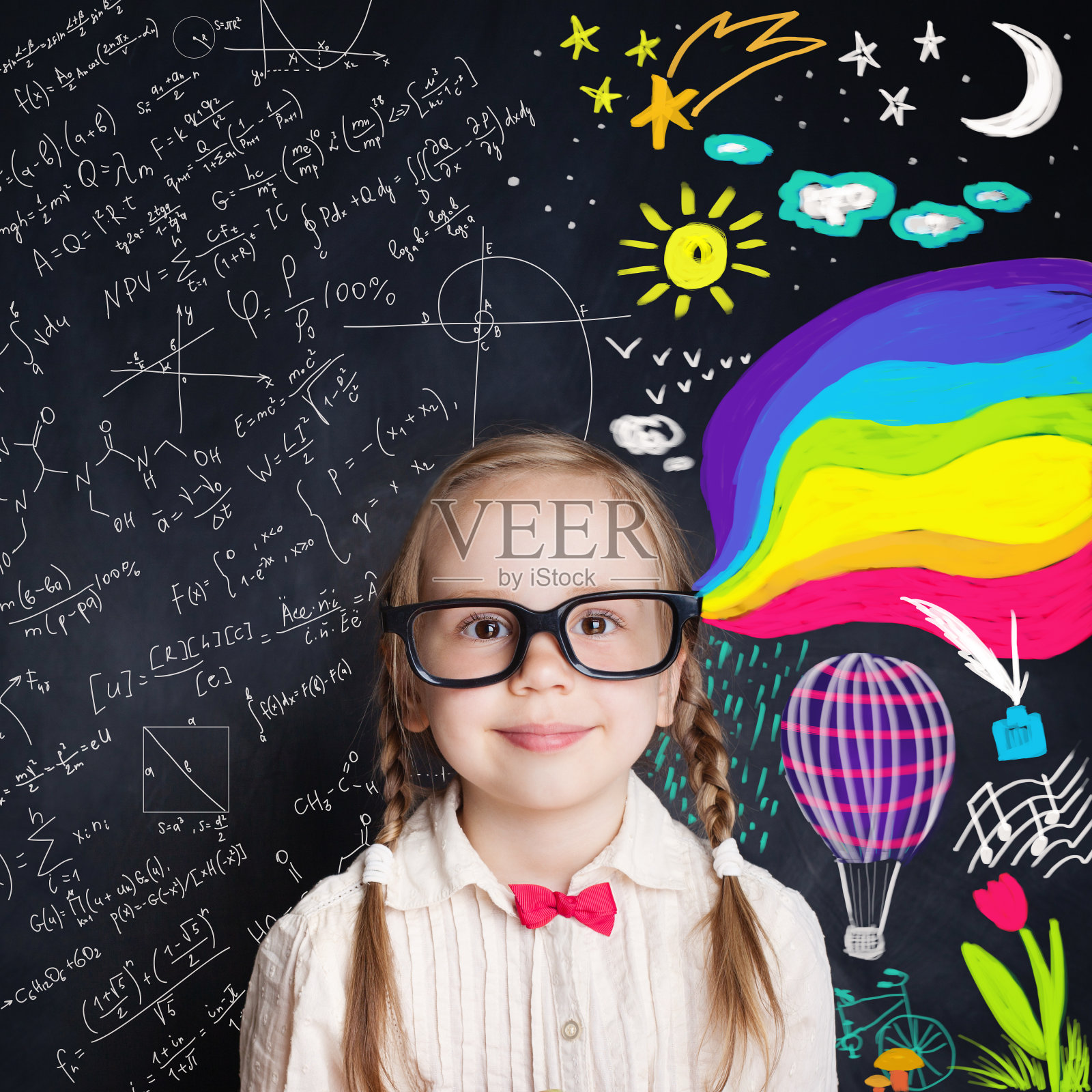 好奇的孩子开启了一个奇妙的知识世界。创意教育与快乐童年理念照片摄影图片