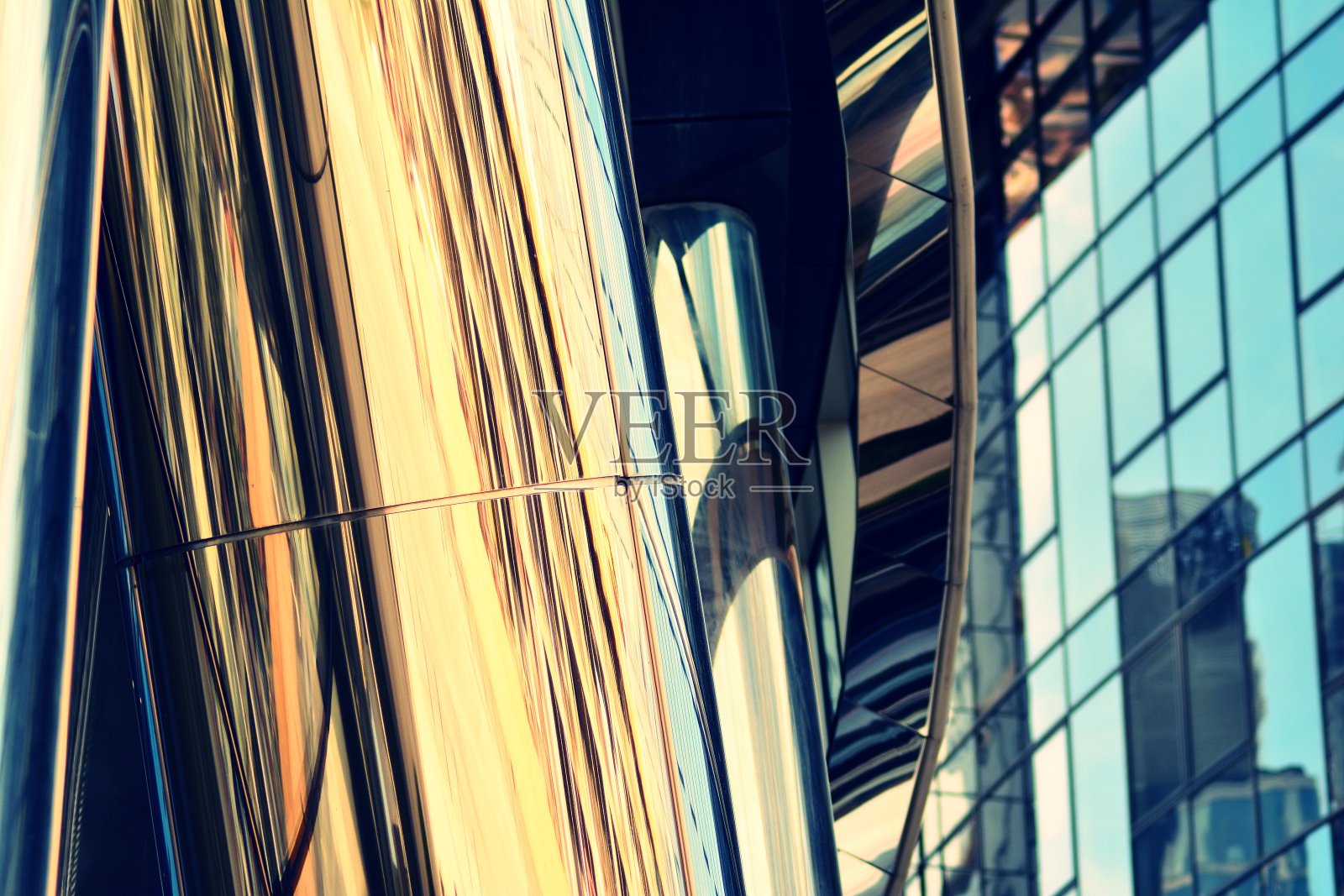 现代办公建筑立面抽象片段，闪亮的钢结构窗户，复古风格化的彩色色调过滤效果照片摄影图片