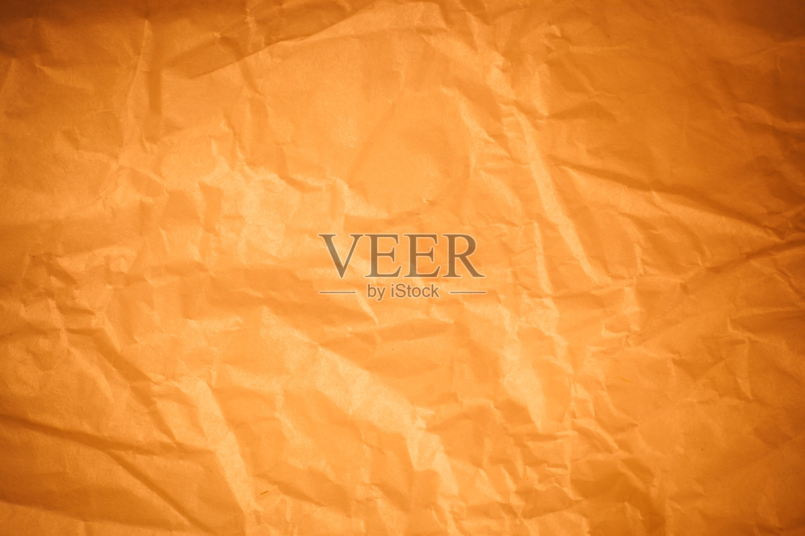 棕色皱巴巴的纸背景。照片摄影图片