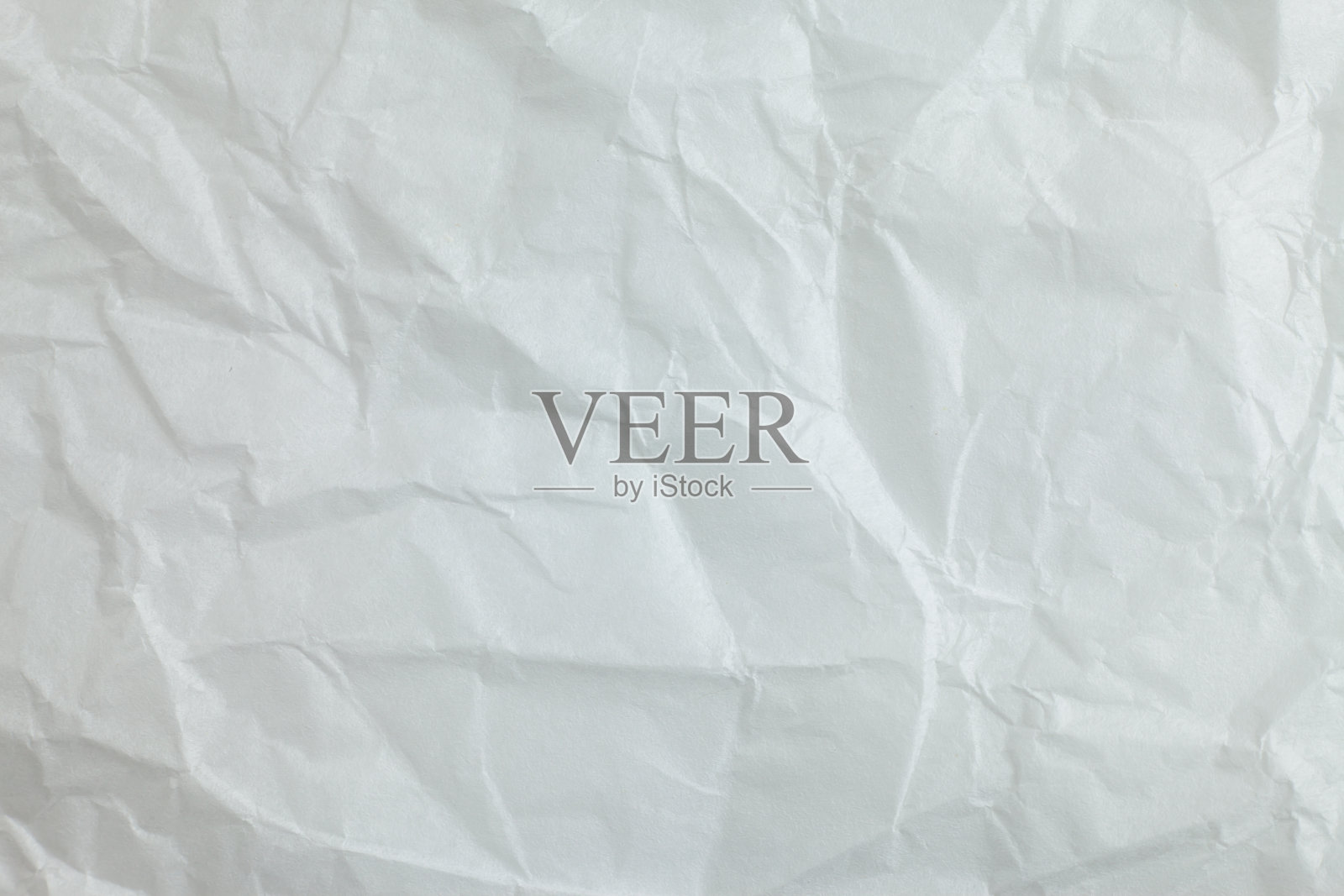 皱巴巴的纸的背景。照片摄影图片