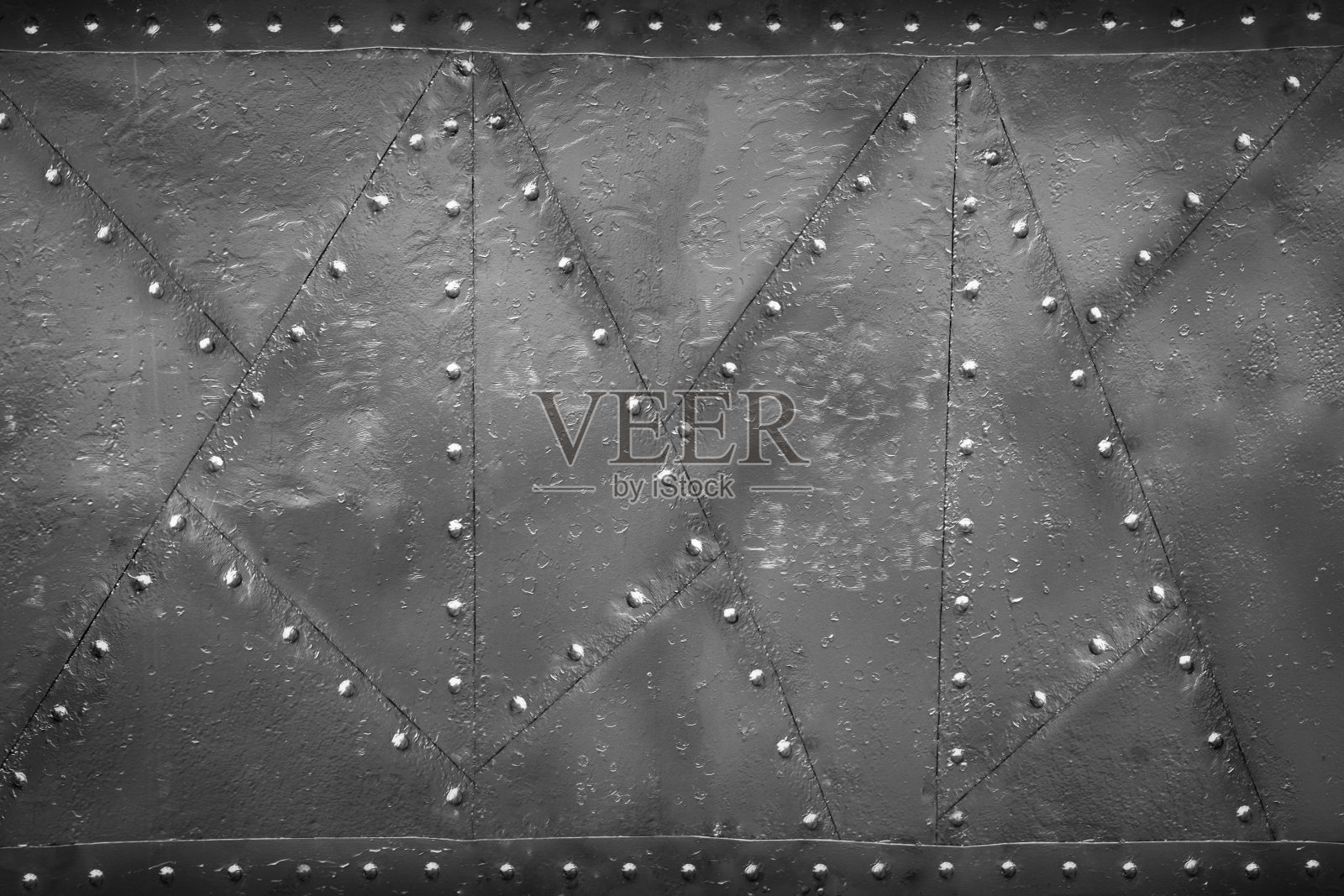 军用铆接金属板倾斜照片摄影图片