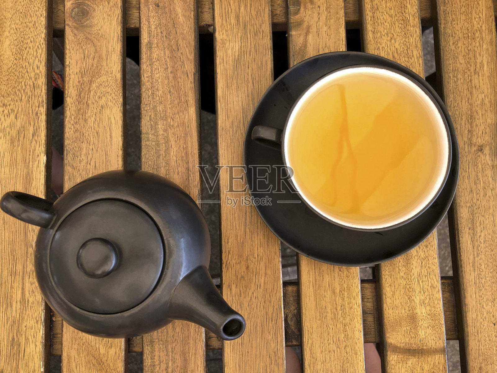 茶壶和一杯绿茶照片摄影图片