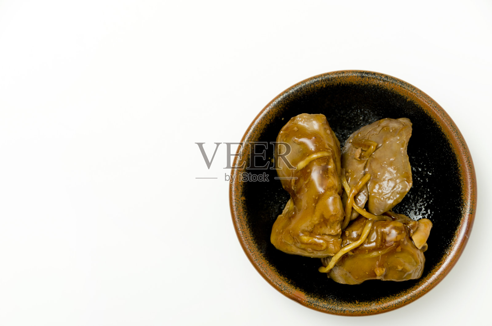 日本料理，鸡肝，用酱油和糖调味。照片摄影图片