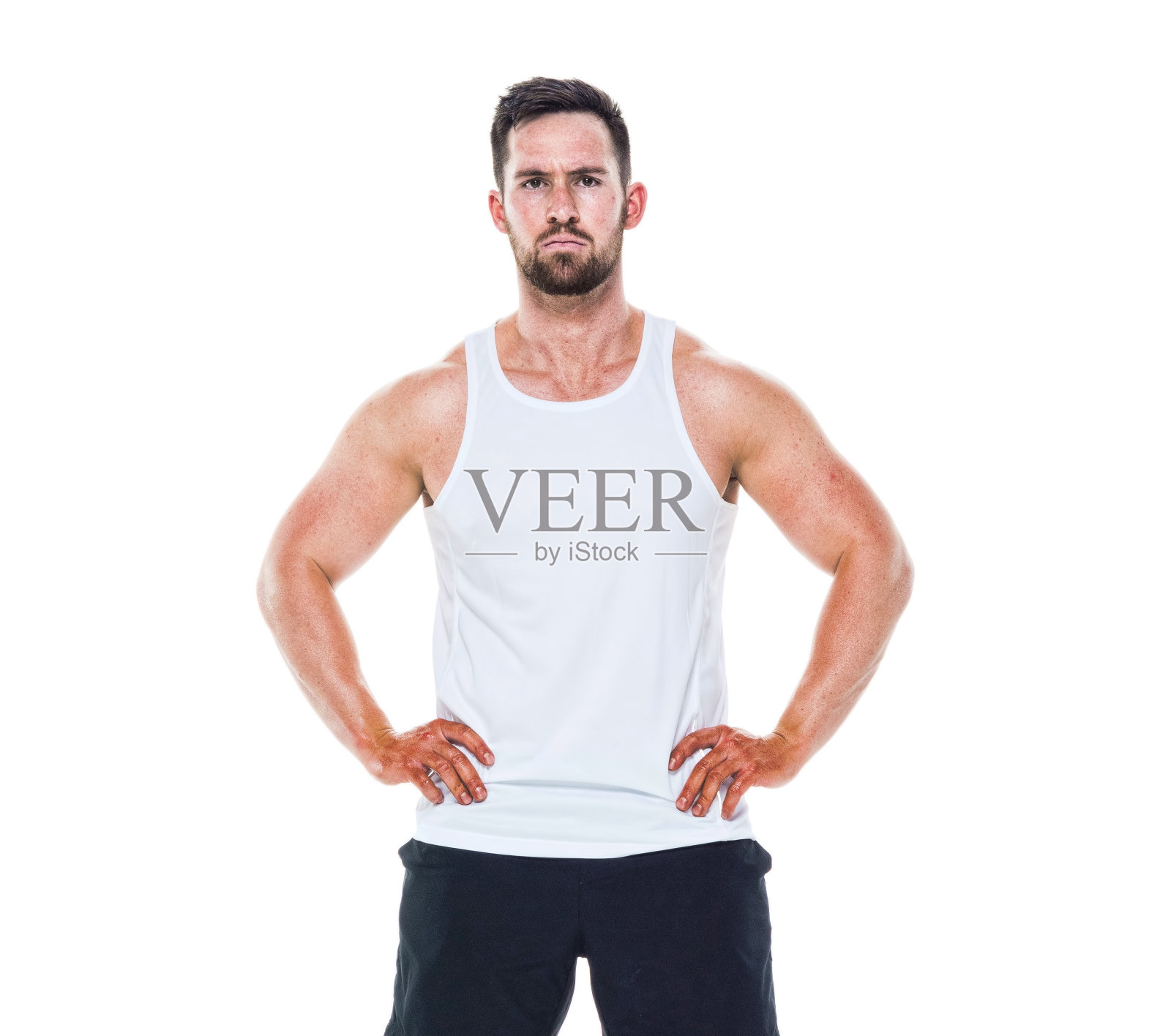 穿着背心的肌肉男照片摄影图片