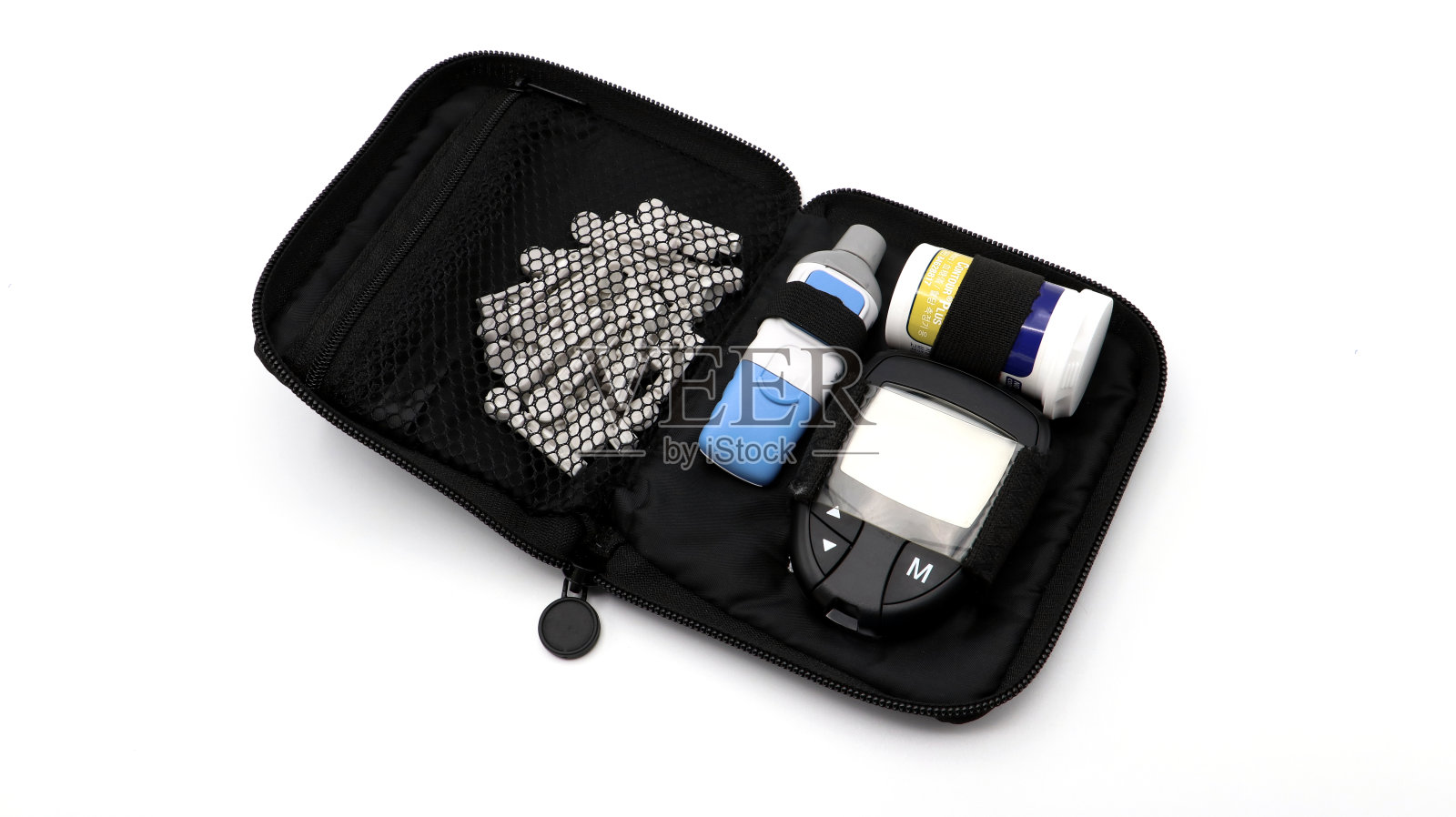 手动检查血糖水平的工具。照片摄影图片