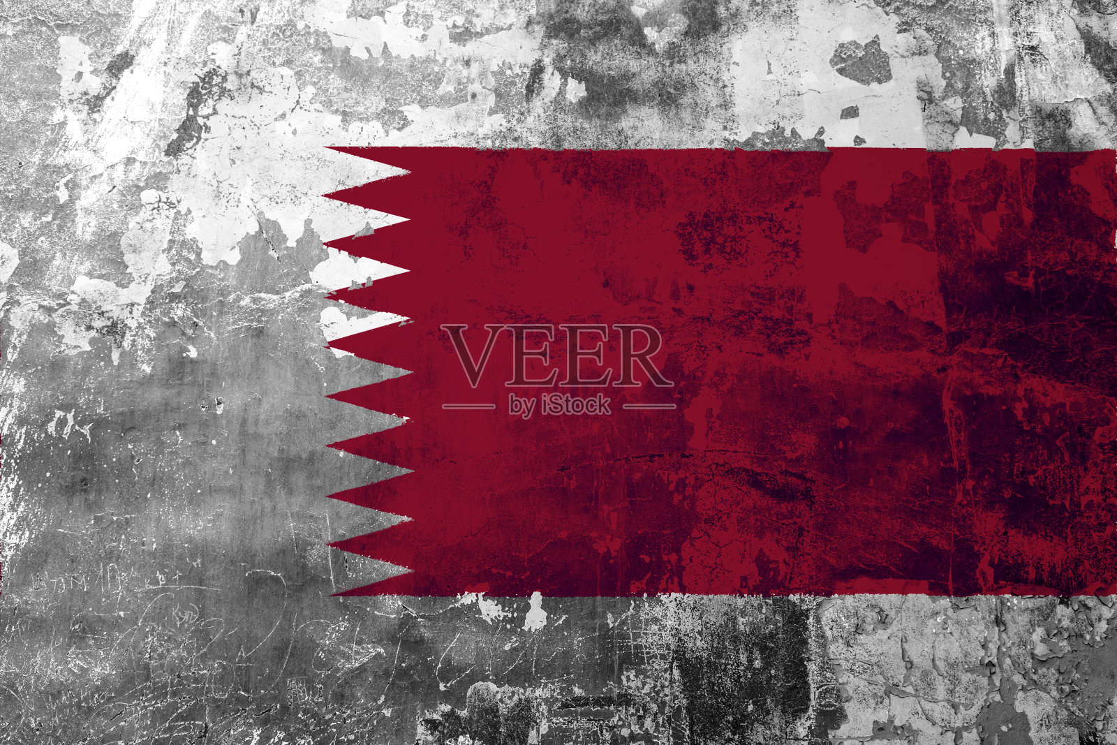 旧墙背景上的卡塔尔国旗照片摄影图片