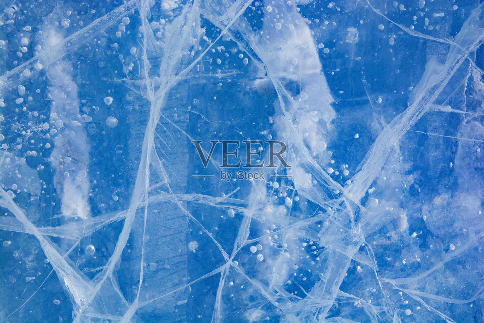冰的质地。冷冻水。冬天的背景照片摄影图片