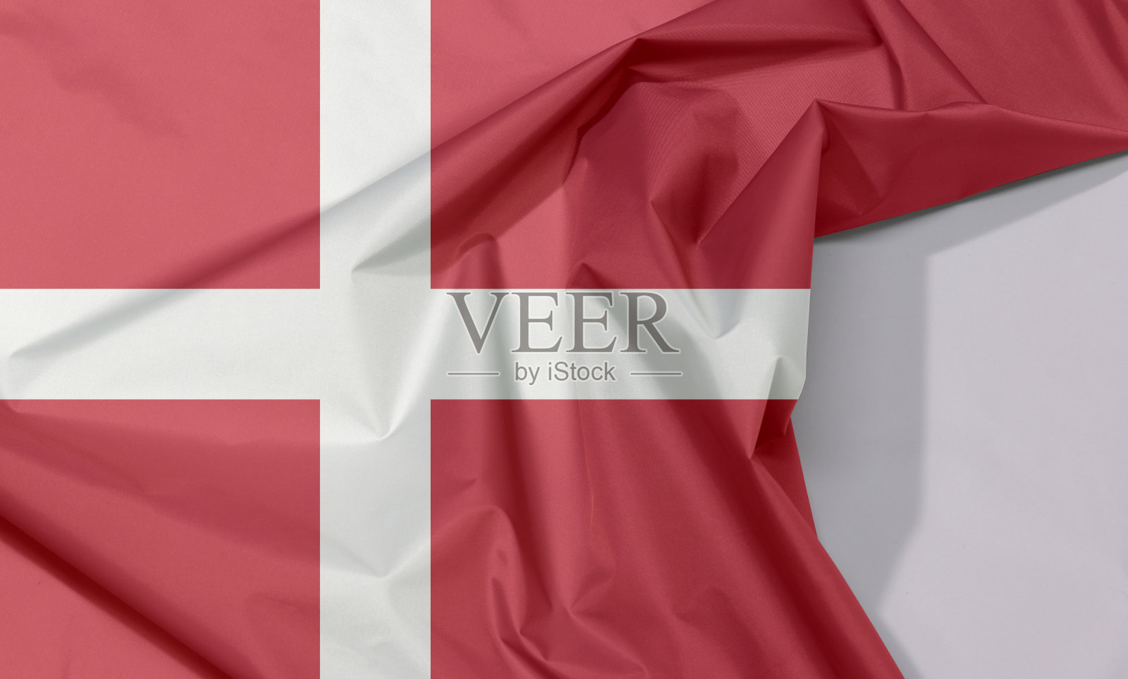 丹麦布旗绉和带有白色空间的折痕。照片摄影图片