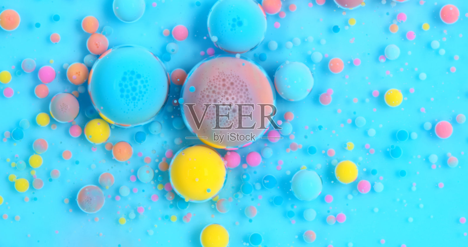 五彩缤纷的颜料泡沫照片摄影图片