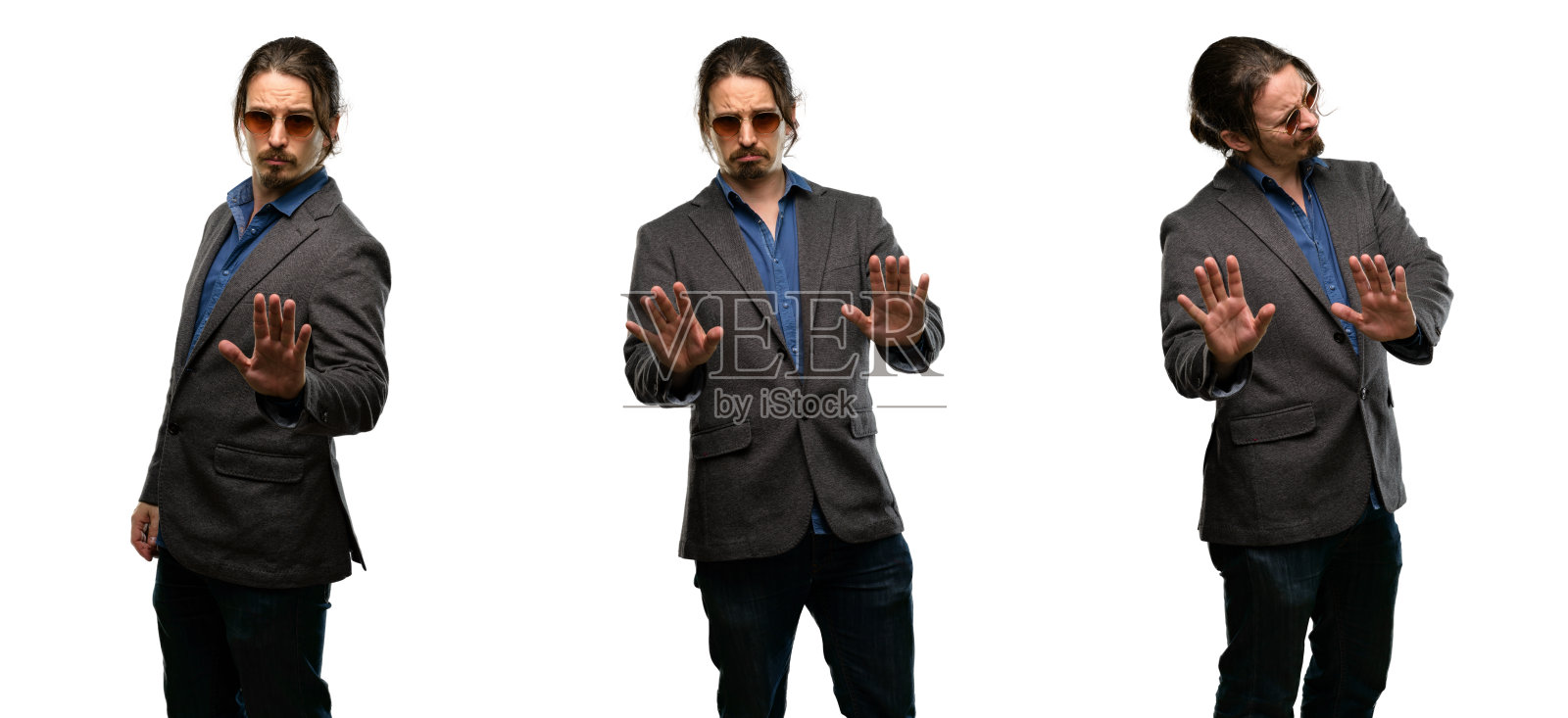 英俊的年轻人对不良的态度感到恼火，用手做停止手势，说不，表示安全，防卫或限制，也许推照片摄影图片