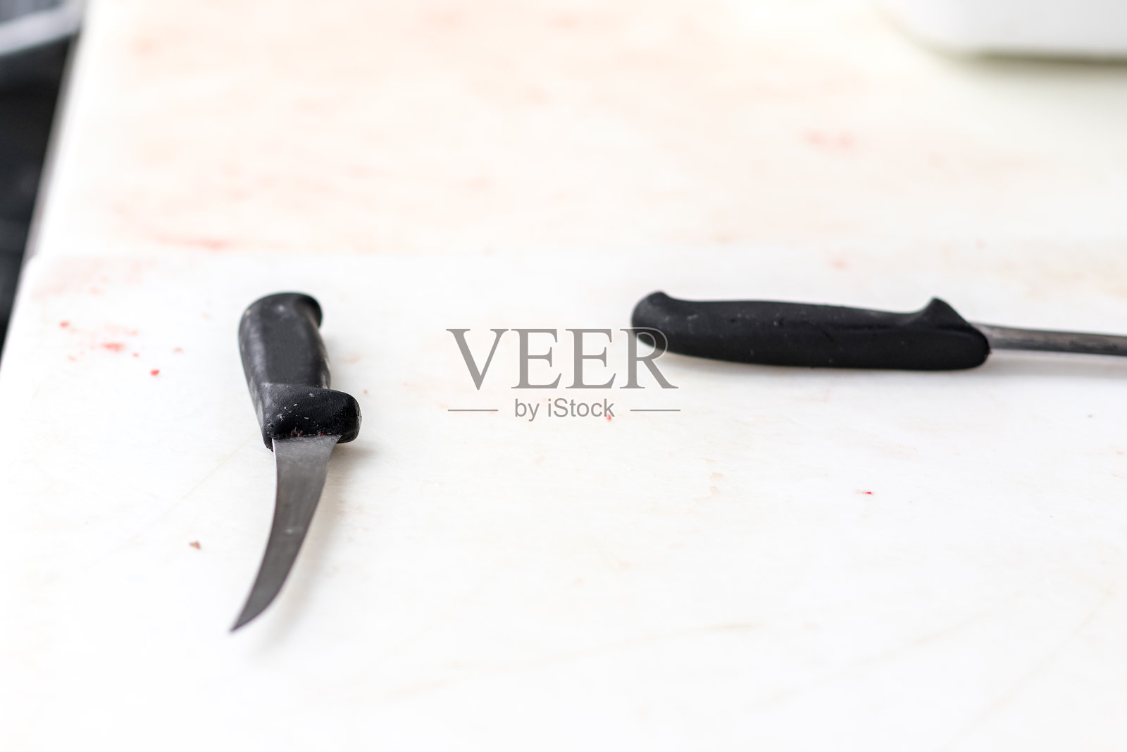 屠夫砧板上的刀子照片摄影图片