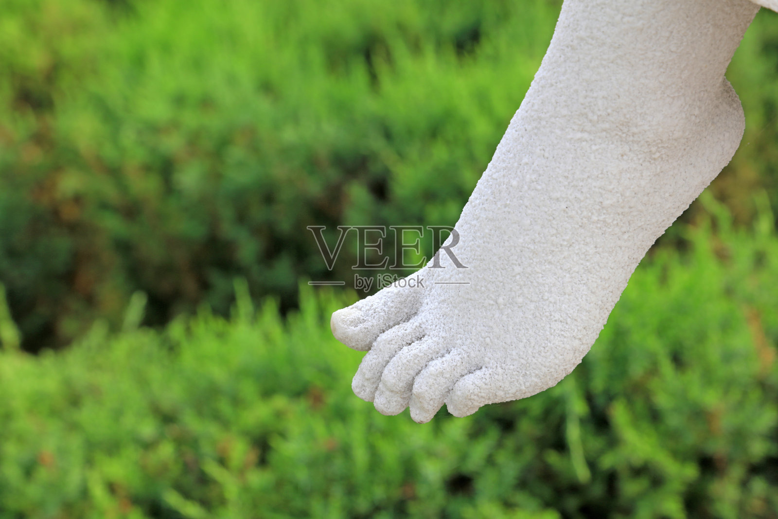 白色女士雕刻的脚照片摄影图片