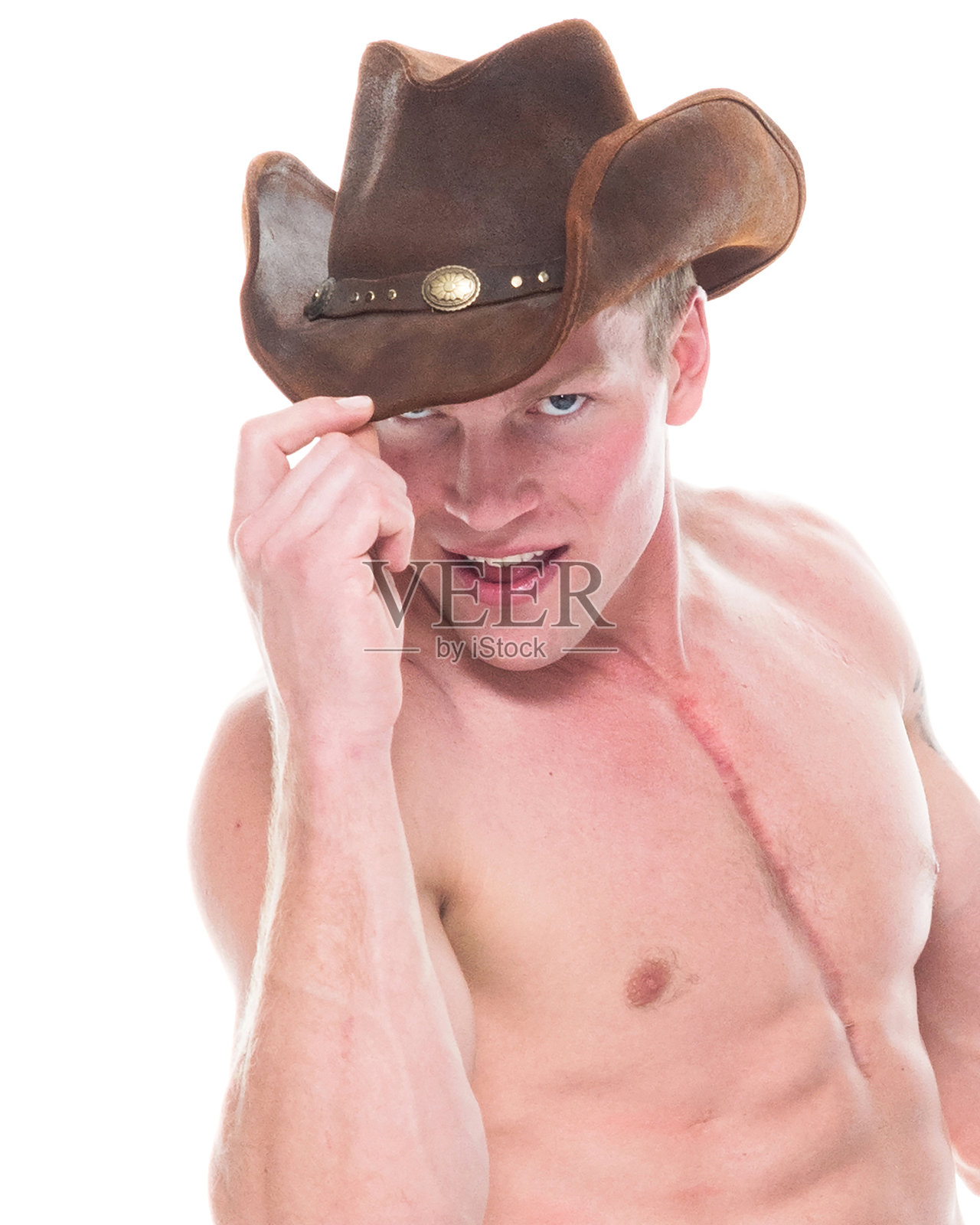 穿着内衣的性感牛仔在弹吉他照片摄影图片