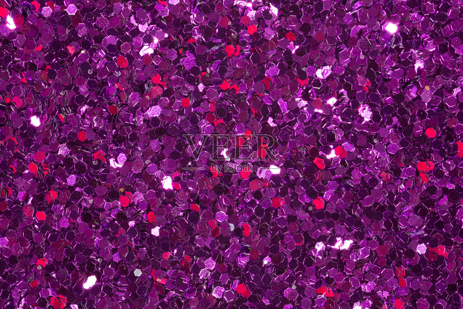 紫色闪光纹理圣诞抽象背景。柔和的淡紫色纹理带光泽。照片摄影图片