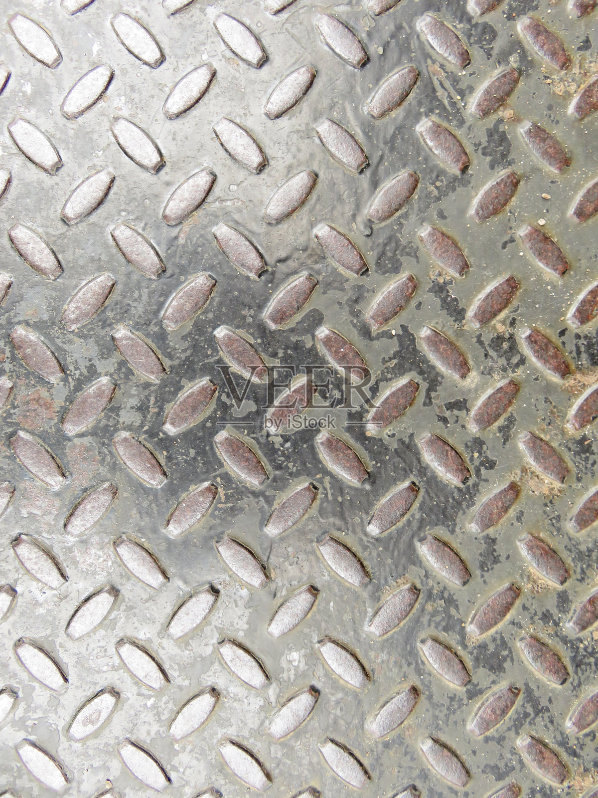 金属背景，穿孔由金属或铁制成照片摄影图片