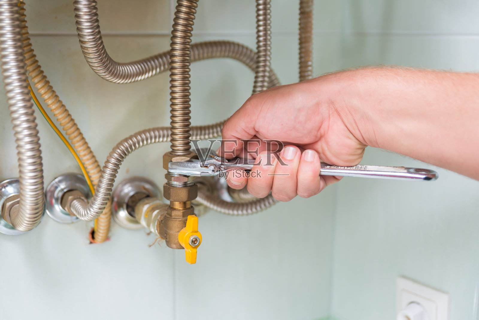 煤气炉维修技师照片摄影图片