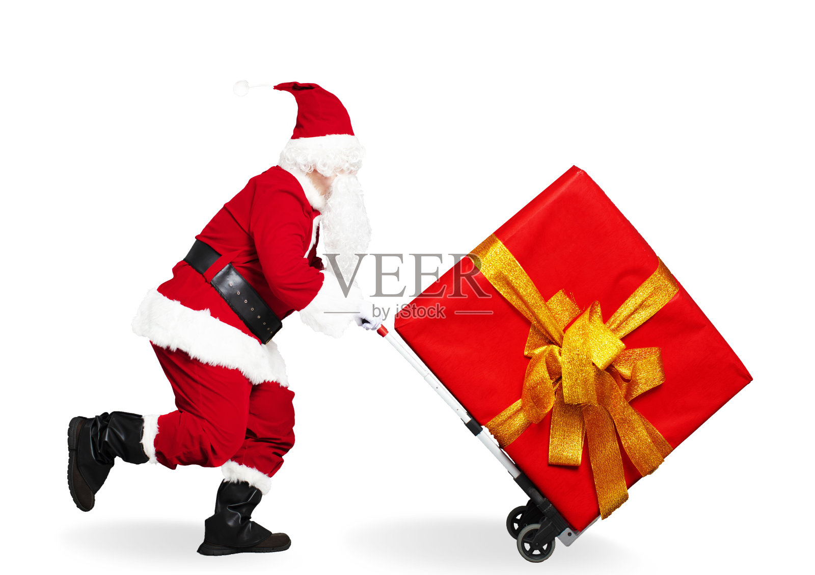 快乐奔跑的圣诞老人推着购物车照片摄影图片