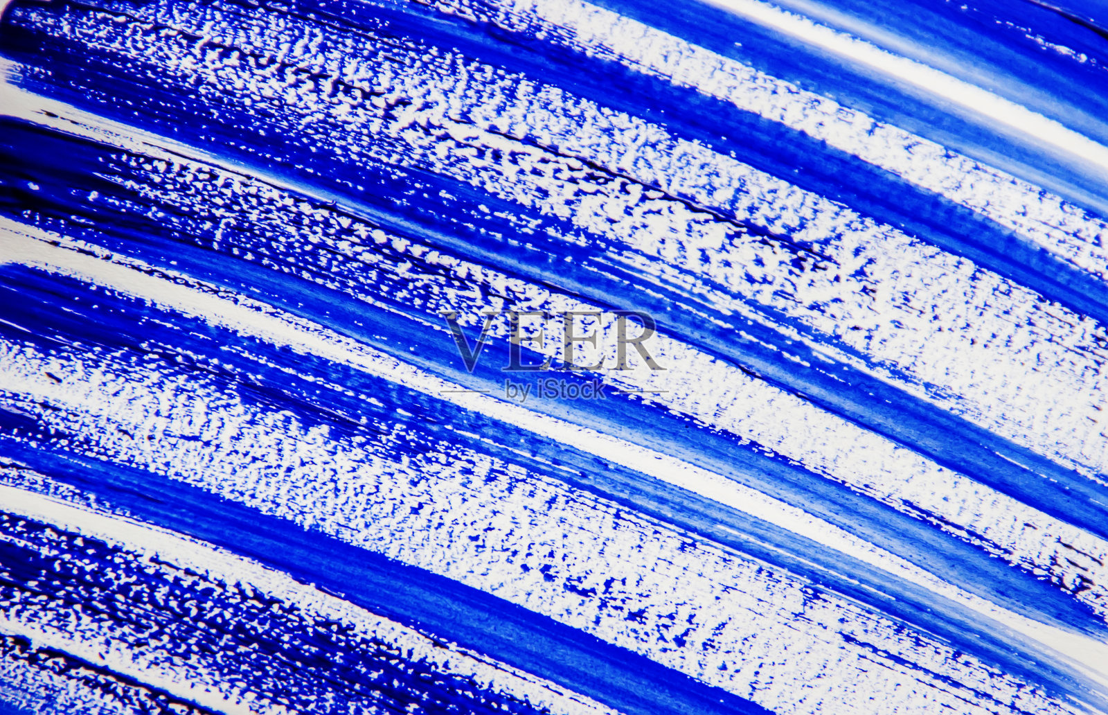 纹理油漆在白色的背景。有选择性的重点。照片摄影图片