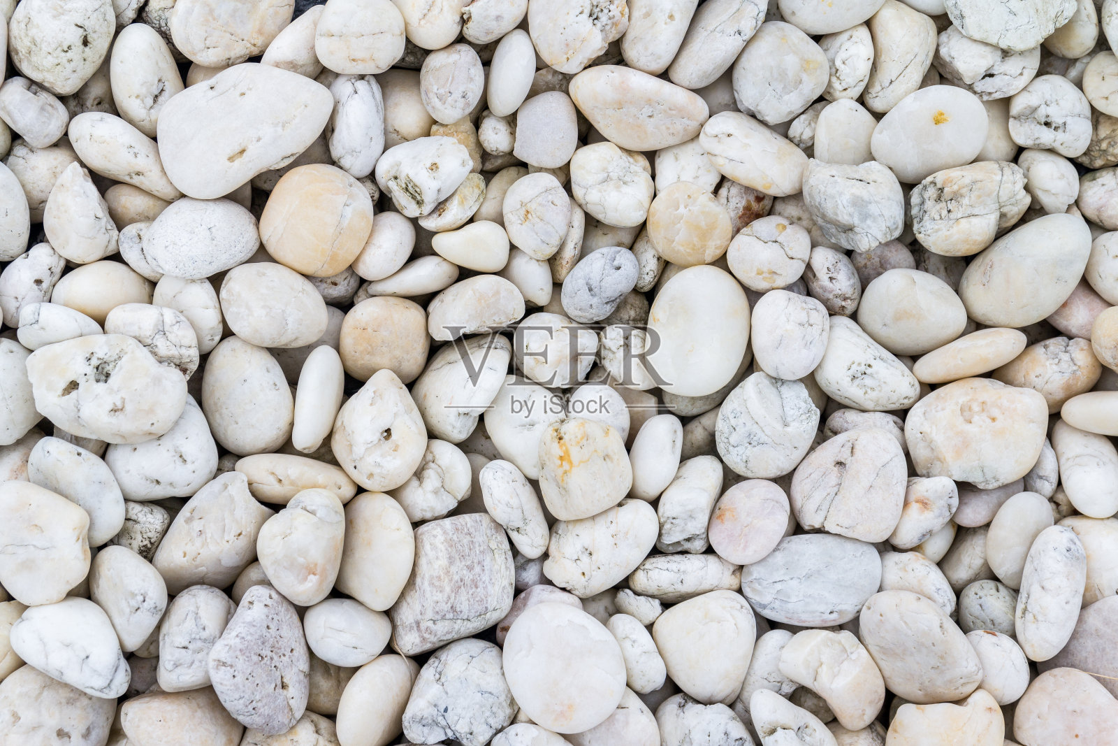 鹅卵石的纹理和背景是白色的照片摄影图片