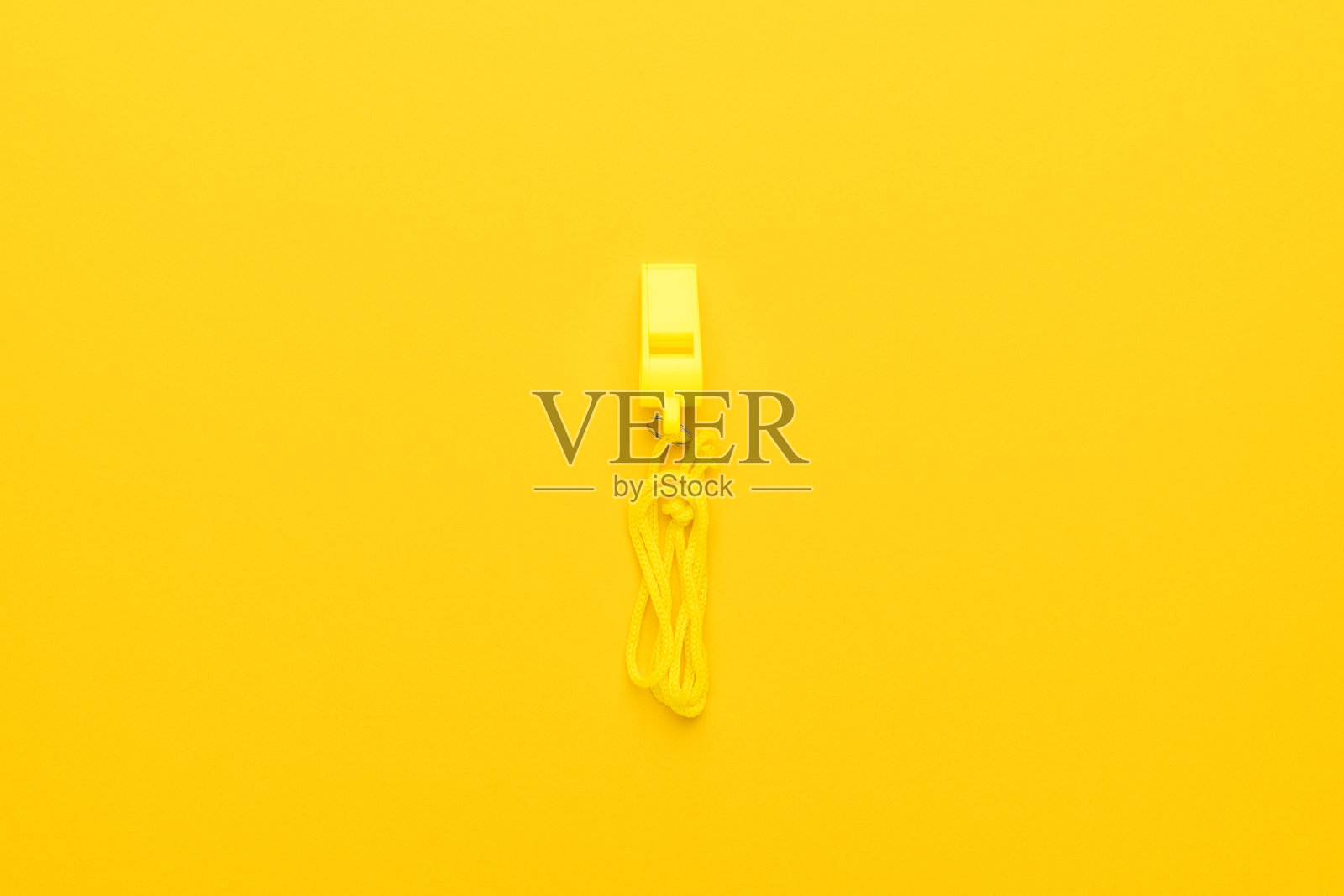 黄色塑料吹口哨照片摄影图片