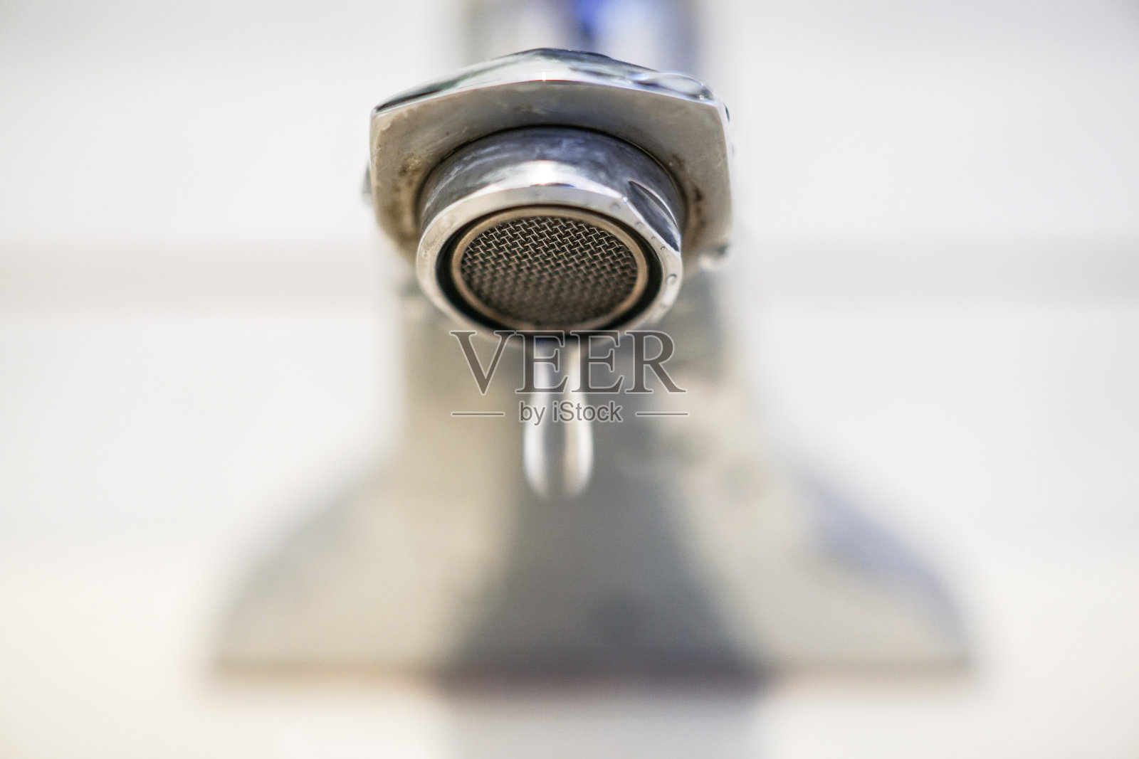 水龙头的特写。照片摄影图片