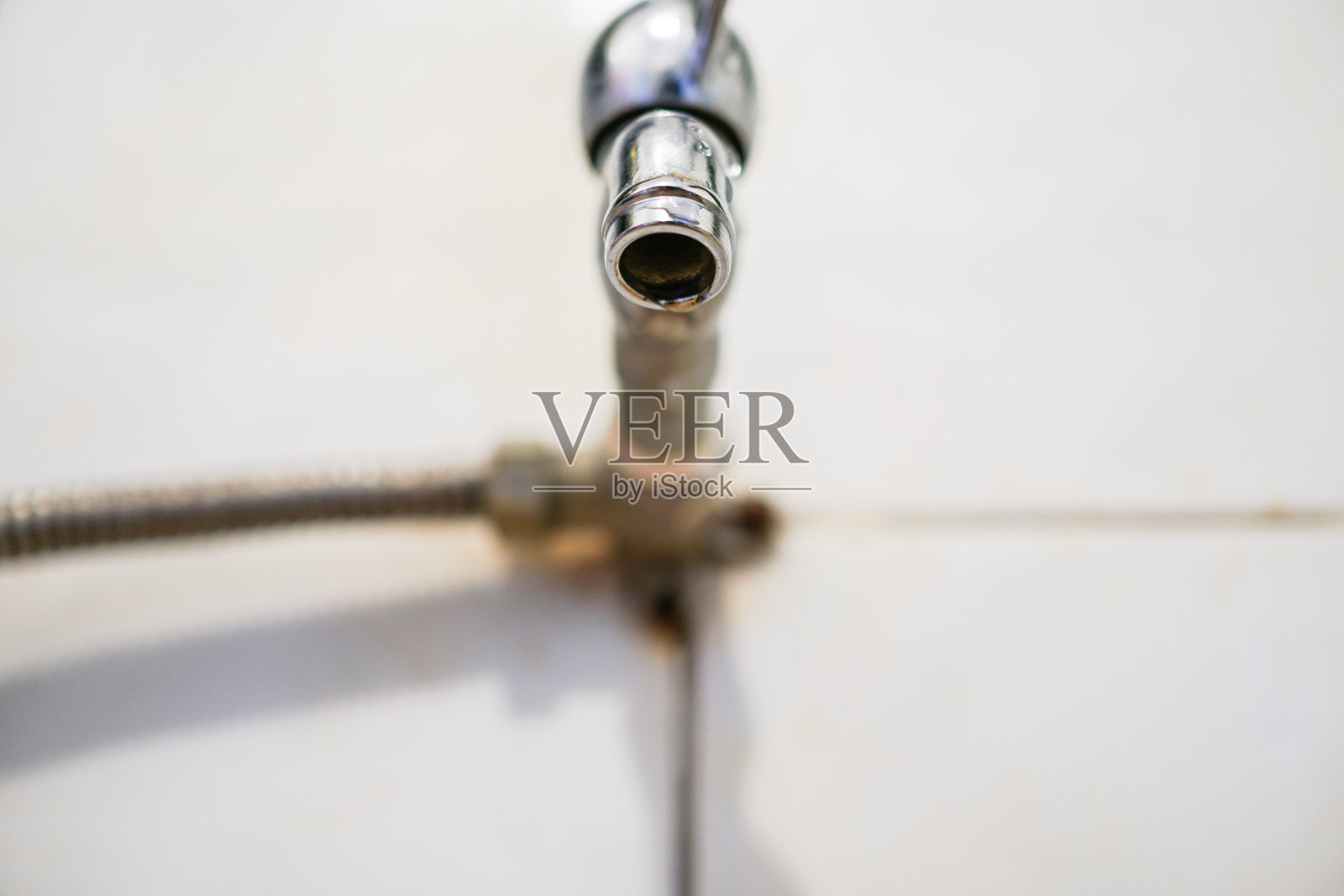 水龙头的特写。照片摄影图片