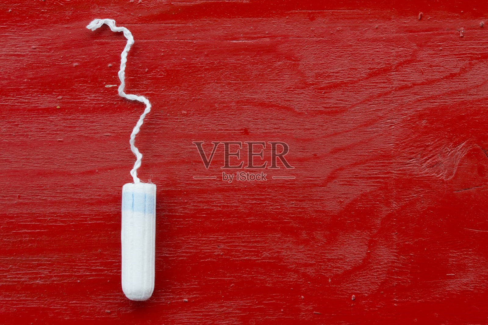 卫生卫生棉条的红木背景照片摄影图片