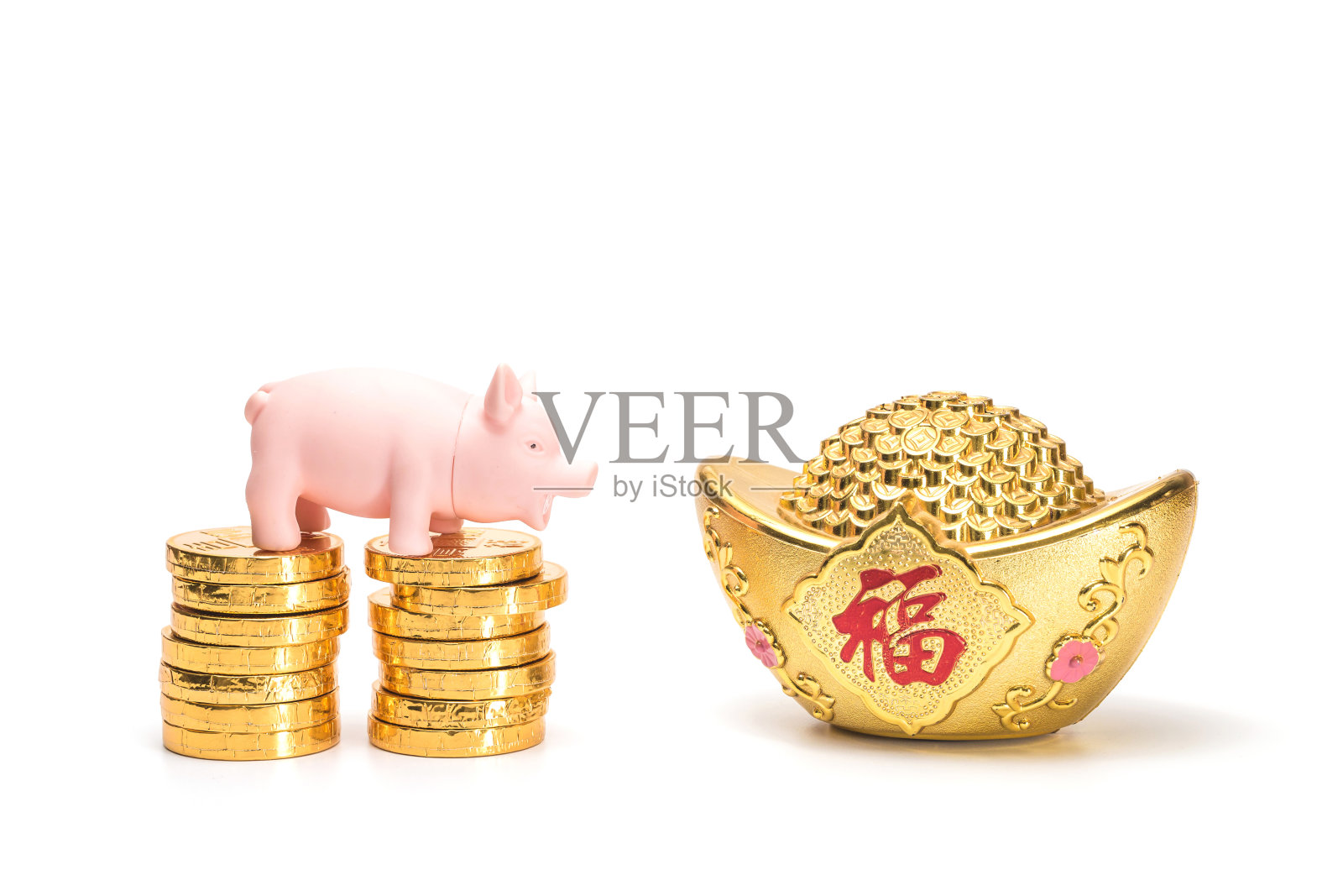 在白色背景上拍摄金锭照片摄影图片