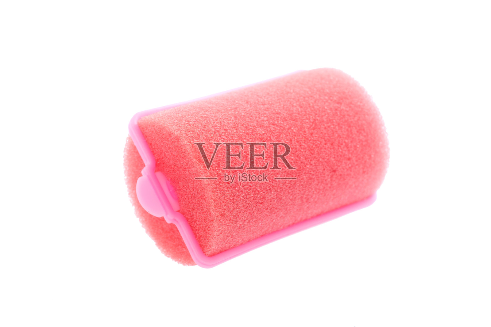 化妆彩色海绵卷曲夹在白色的背景照片摄影图片