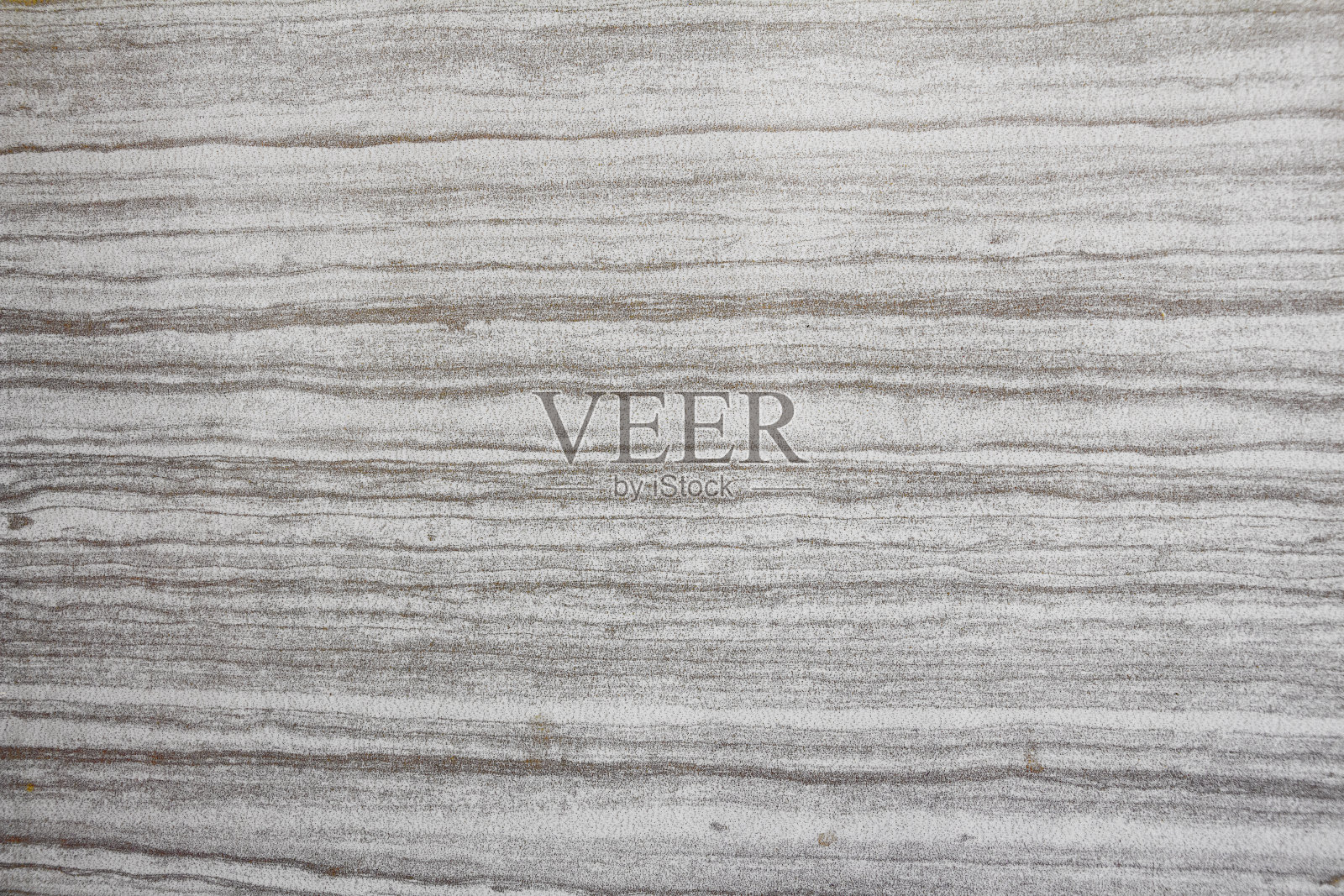 灰色大理石纹理中透出微妙的白色纹理(自然图案作为背景，也可用于建筑板、瓷砖和墙砖的表面效果)照片摄影图片