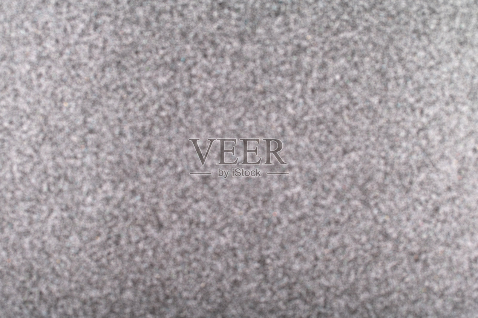 灰色模糊抽象背景，微小的散景纹理。照片摄影图片