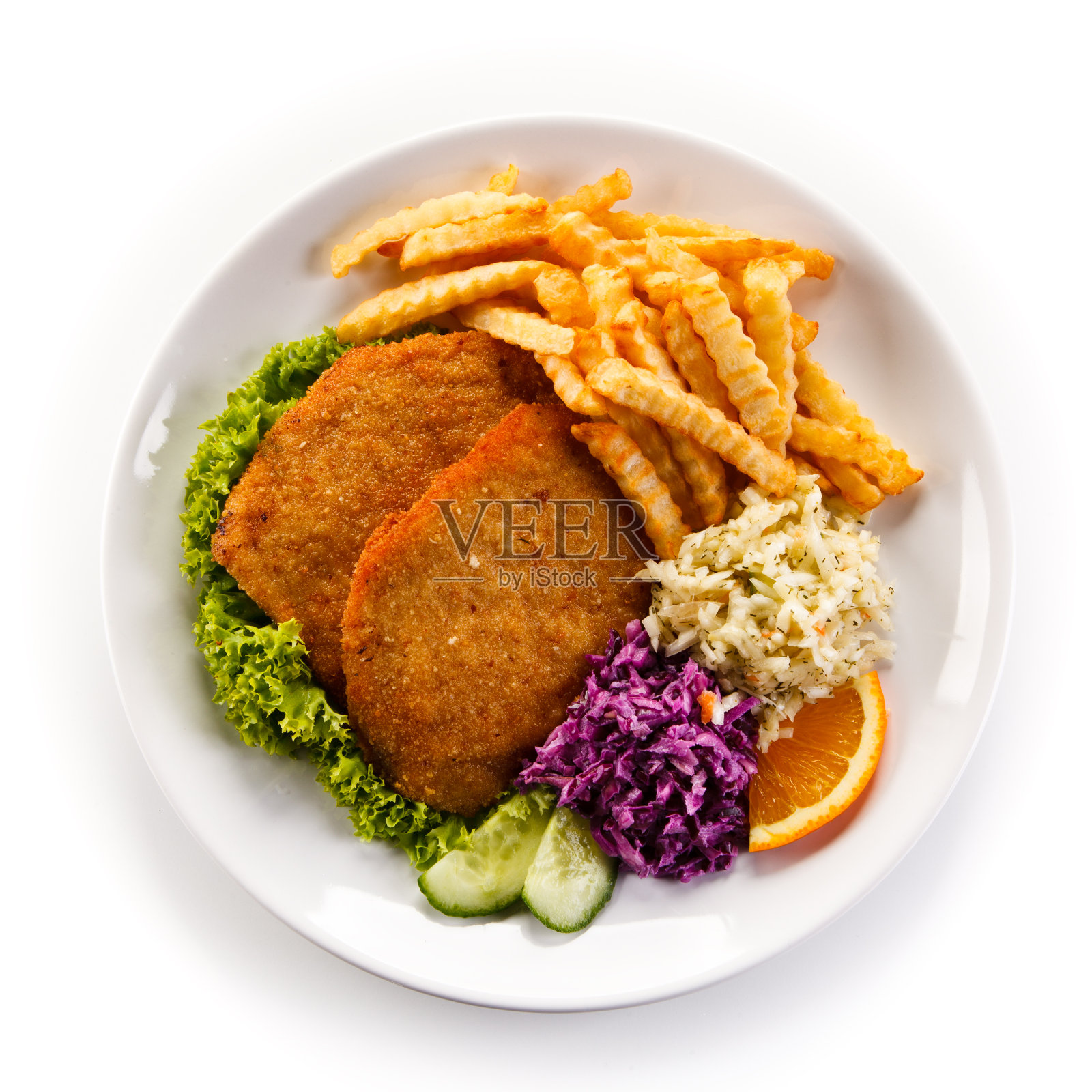 炸猪排、炸薯条和蔬菜照片摄影图片