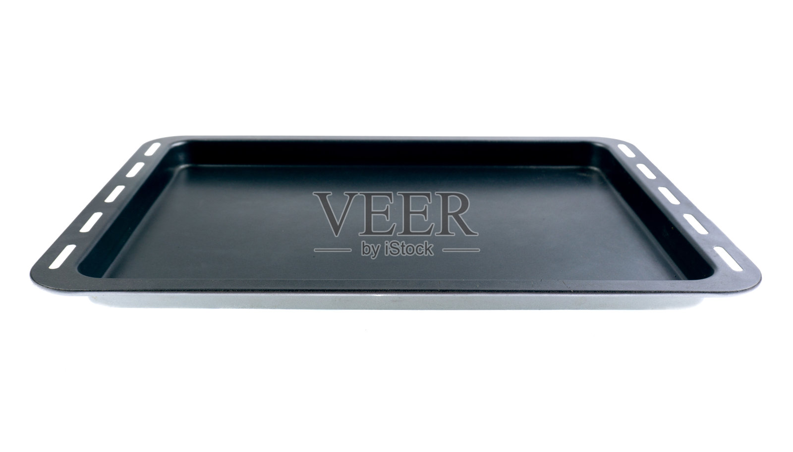 制作蛋糕、面包和松饼的不同类型的烤盘和模具。照片摄影图片