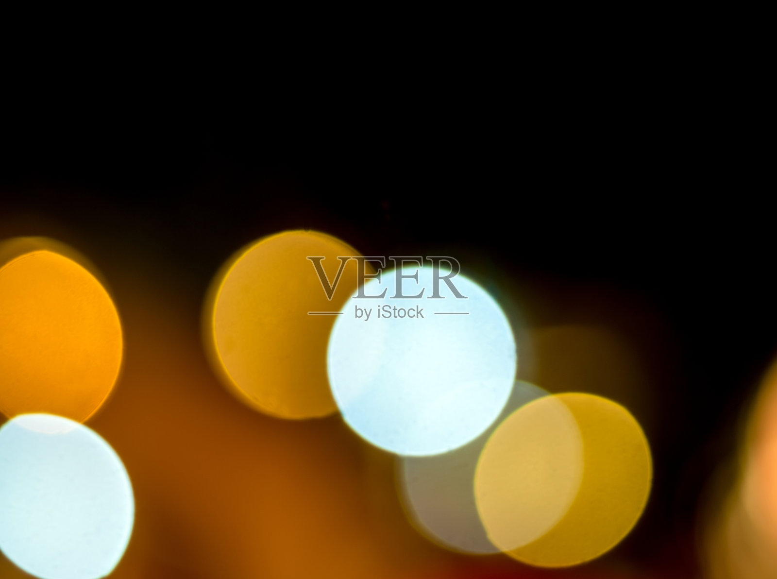 以夜间灯光为背景的散景照片摄影图片