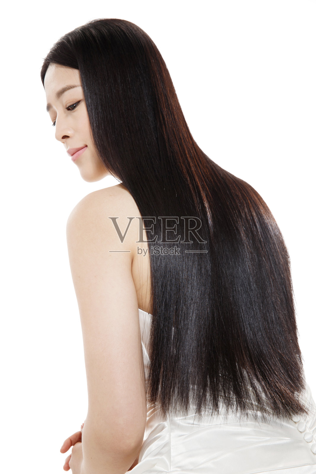 青年女人亮丽丝缎般的头发照片摄影图片