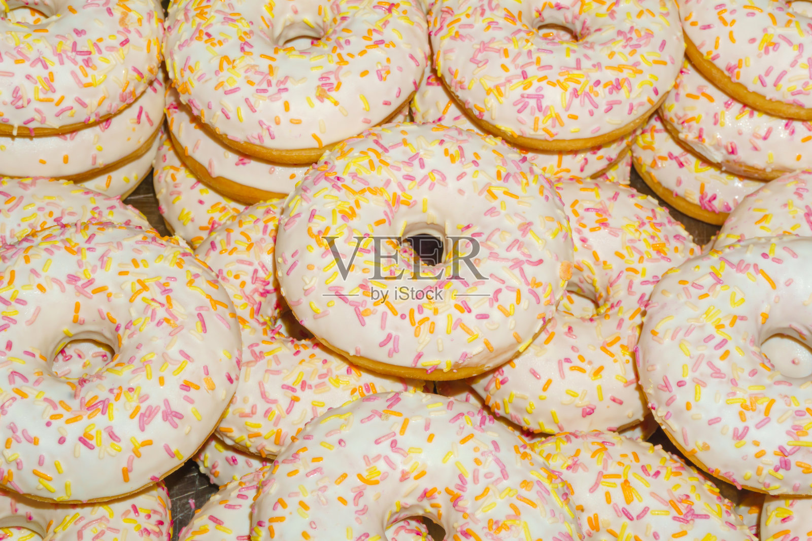 背景上的甜甜圈照片摄影图片