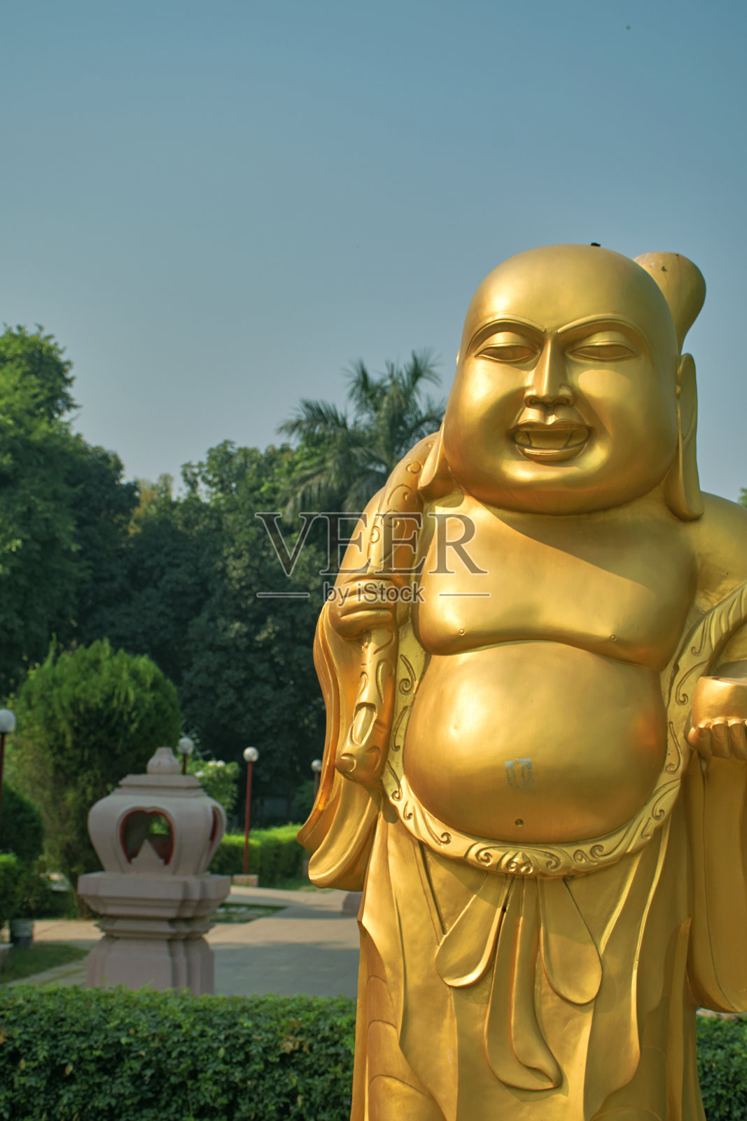 印度北方邦的泰国寺庙和萨那寺的笑佛照片摄影图片