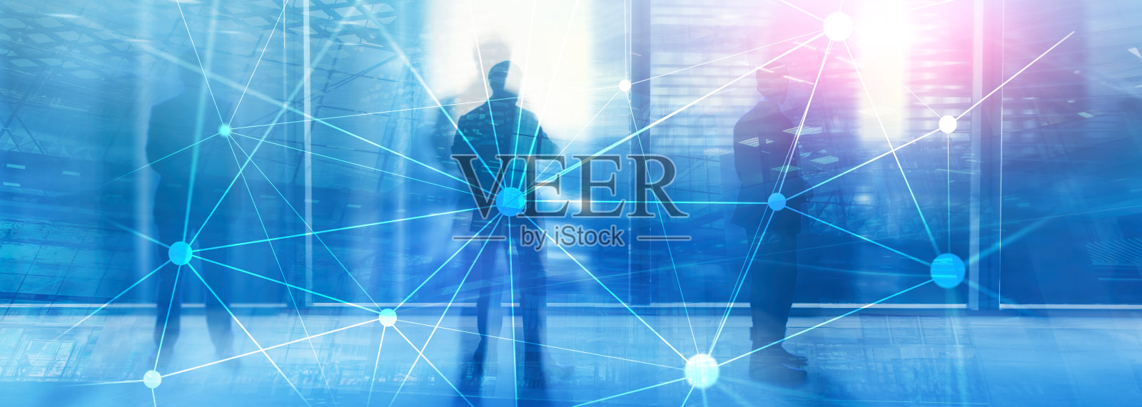 在模糊的摩天大楼背景上使用区块链网络。金融技术与通讯概念。照片摄影图片