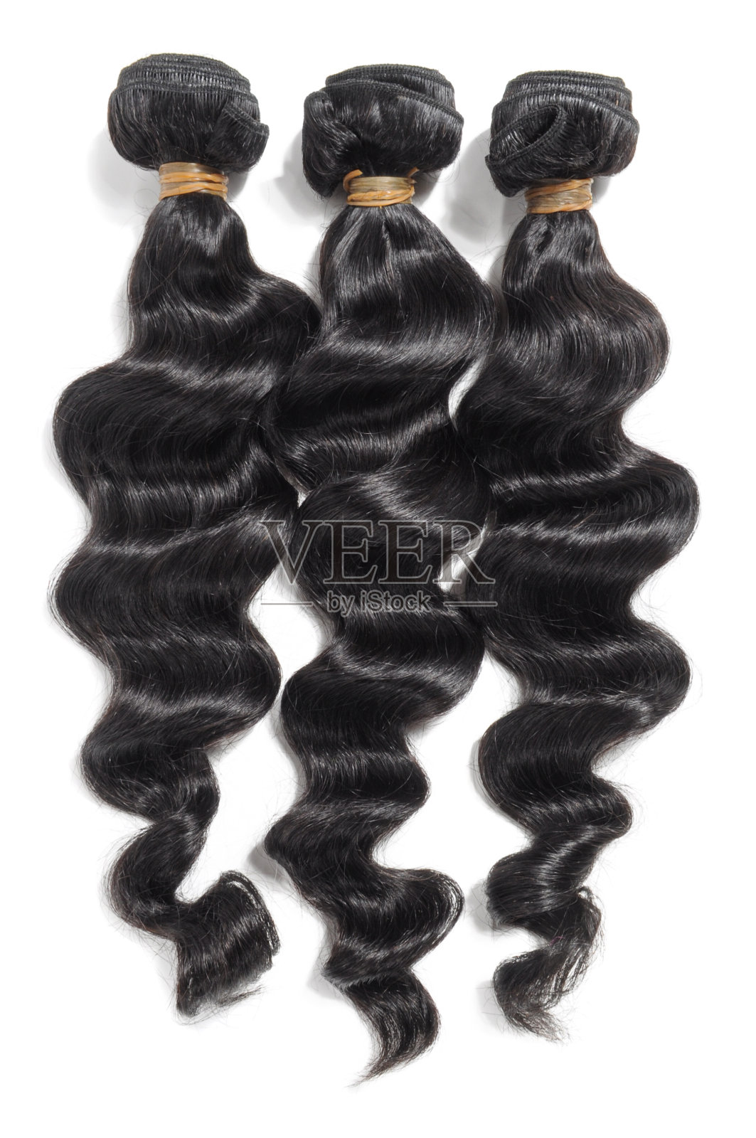 松散卷曲的黑发编织延伸束照片摄影图片