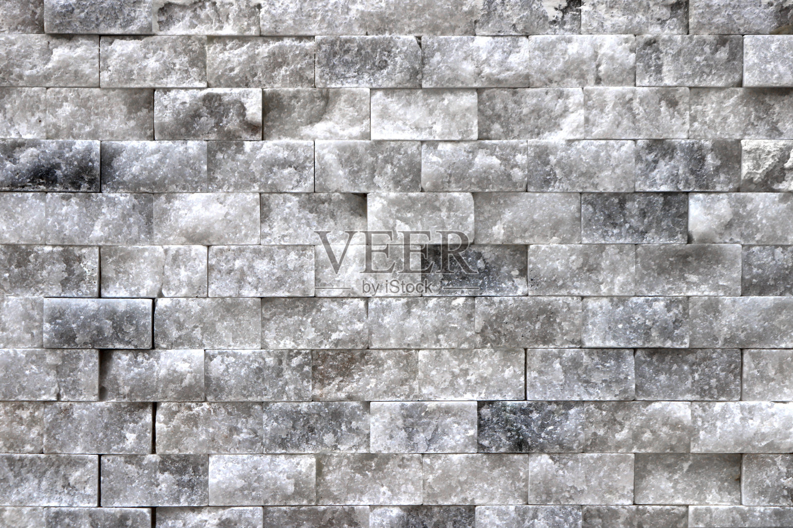 雪花石膏瓷砖墙面纹理。白色石材表面的室内背景。照片摄影图片