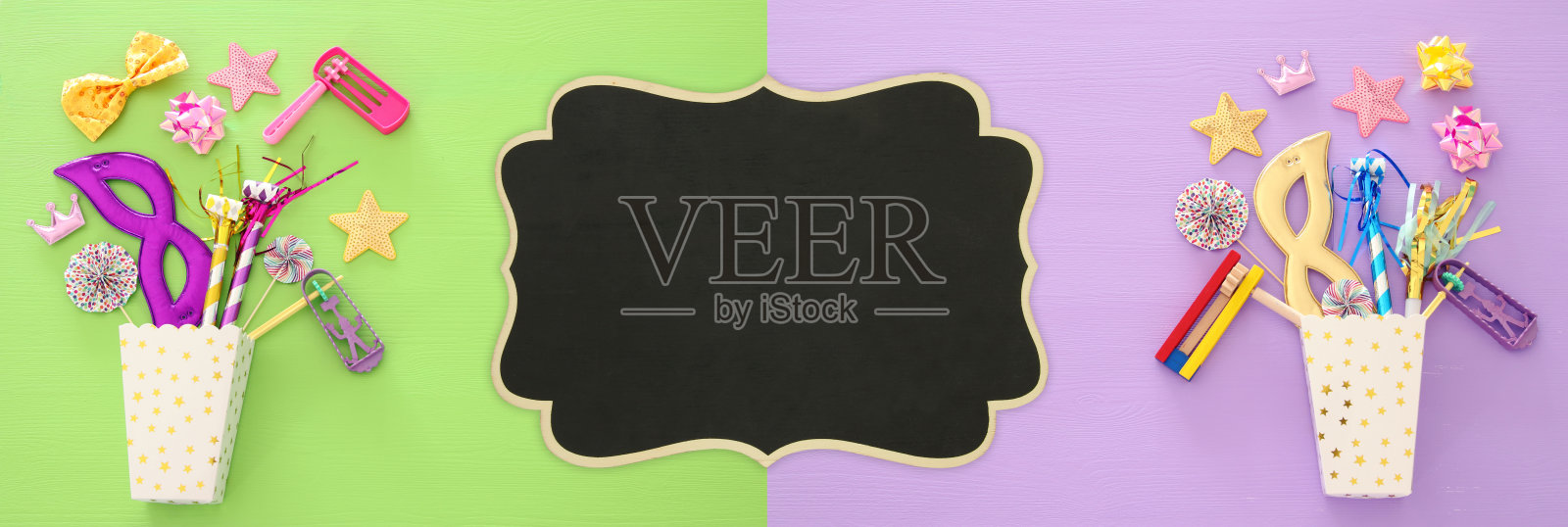 普林节庆祝概念(犹太狂欢节节日)在绿色和粉红色的木制背景。前视图。横幅。照片摄影图片