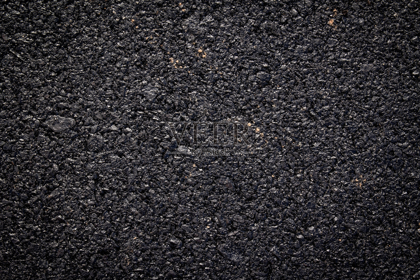 新沥青路面纹理的特写照片摄影图片